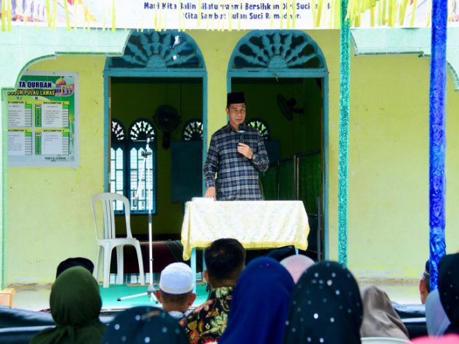 
					Bupati Kampar Hadiri Jemputan Pulang Kampuong Basamo di Desa Pulau Lawas